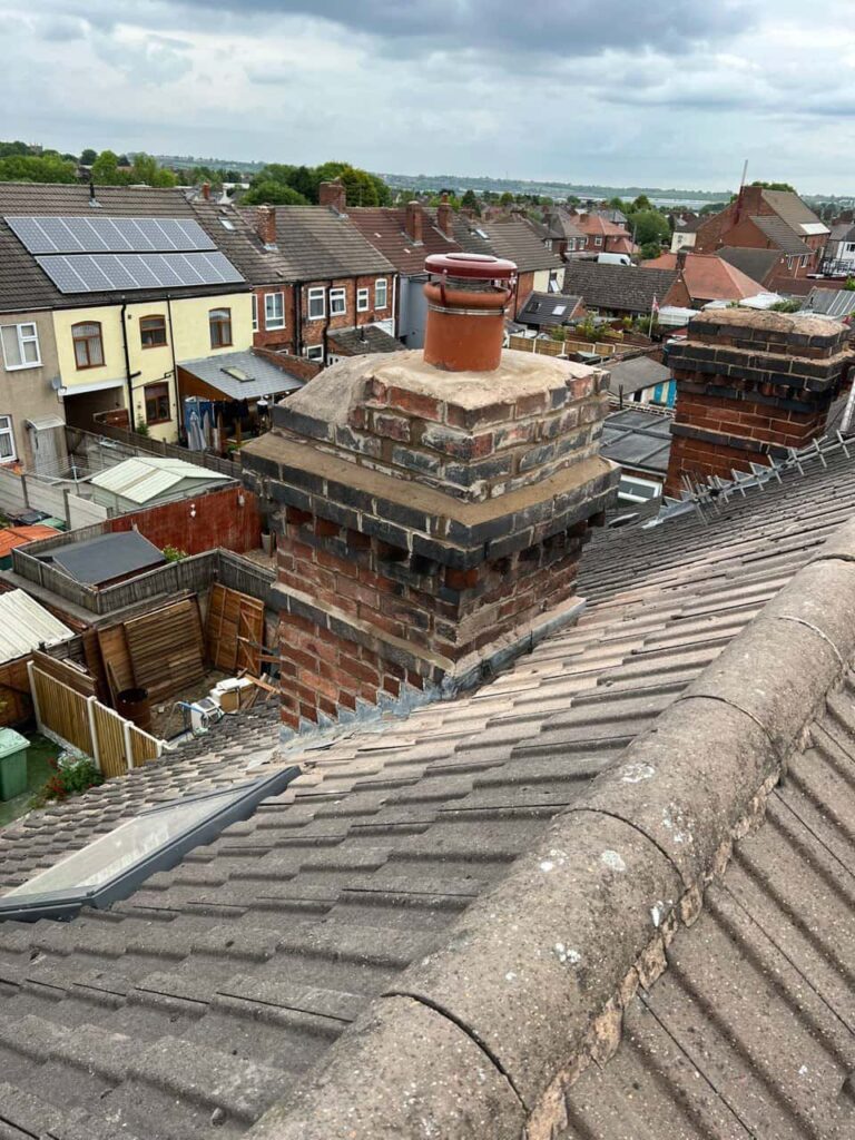 This is a photo taken from a roof which is being repaired by Westerham Roofing Repairs, it shows a street of houses, and their roofs